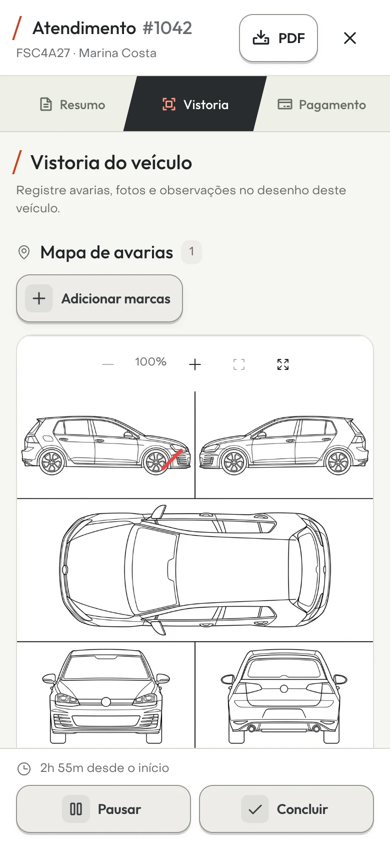 Vistoria de um Golf GTI no celular: avaria marcada no desenho do carro e a foto da chegada